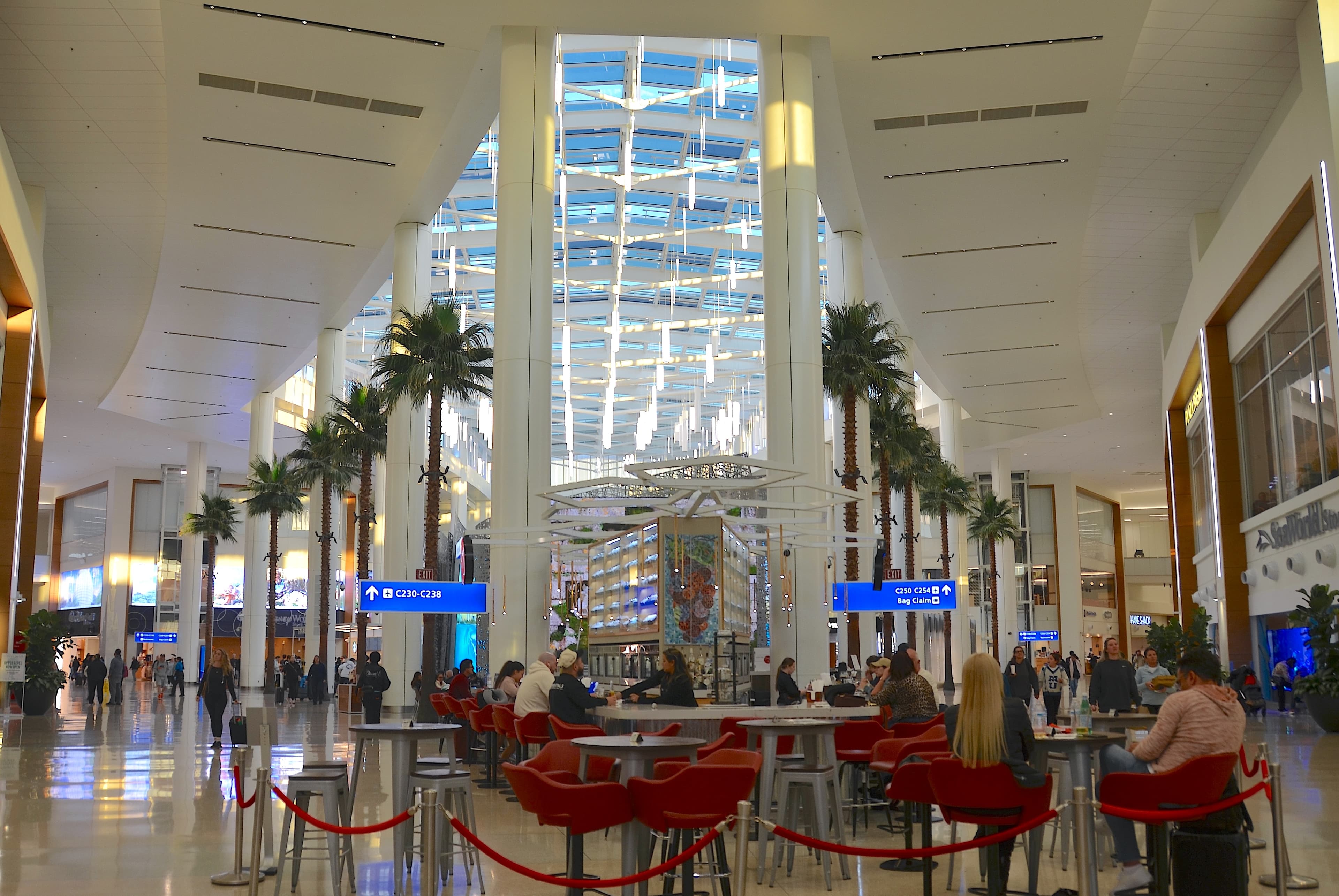 Palm-lined atrium in Terminal C at Orlando International Airport (MCO)