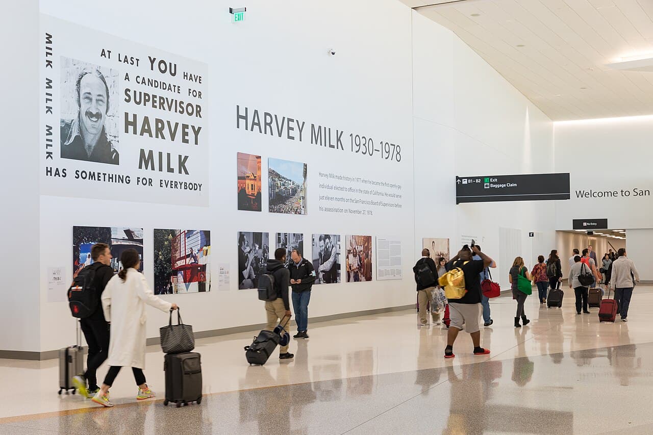 Travelers inside Harvey Milk Terminal 1 at San Francisco International Airport (SFO)