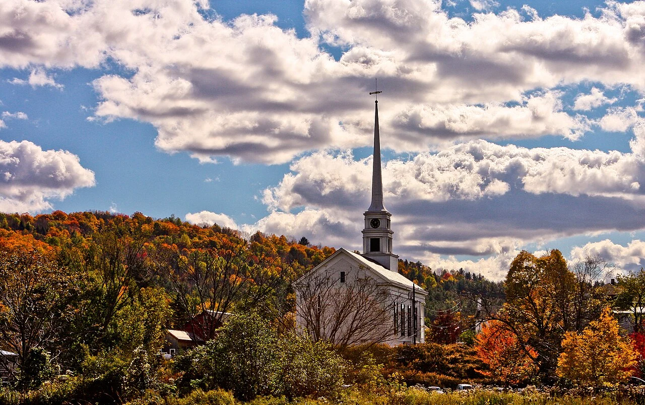 Stowe Community Church surrounded by autumn foliage, Vermont
